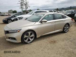 2018 Honda Accord Touring z VIN 1HGCV2F97JA003152, wystawiony jako Copart lot #54576185 z przebiegiem 111 310 mil mil oraz Szkoda całkowita • Salvage title. Historia ofert i sprzedaży dostępna na DreamBid. Obrazek 1.