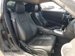 2007 Nissan 350Z with VIN JN1BZ34D97M504887, listed as a Copart auction lot 77140104 with 115,128 mi miles and Salvage Title. Bid and sale history available at DreamBid. Image 10.