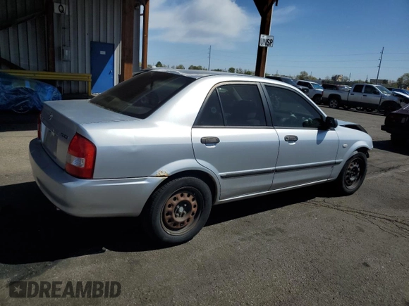 2003 Mazda Protege DX with VIN JM1BJ225730217866, listed as a Copart auction lot 53854075 with 105,782 mi miles and Salvage Title. Bid and sale history available at DreamBid. Image 3.