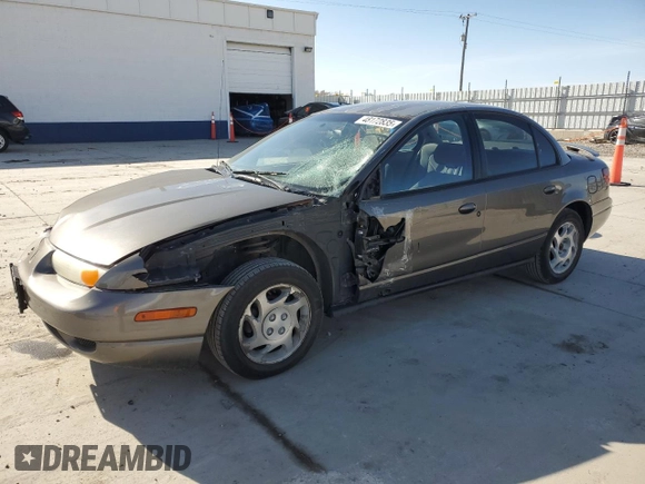 2000 Saturn SL with VIN 1G8ZK5276YZ227493, listed as a Copart auction lot 48172835 with 105,806 mi miles and Salvage title. Bid and sale history available at DreamBid. Image 1.
