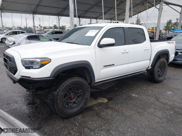 2022 Toyota Tacoma 4WD SR with VIN 3TMCZ5AN7NM496008, listed as a IAAI auction lot 41559734 with 25,726 mi miles. Bid and sale history available at carsss.com. Image 17.