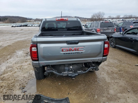 2023 GMC Canyon 4WD Denali with VIN 1GTP6FEK2P1176773, listed as a Copart auction lot 46045715 with 9,711 mi miles and Salvage Title. Bid and sale history available at carsss.com. Image 6.