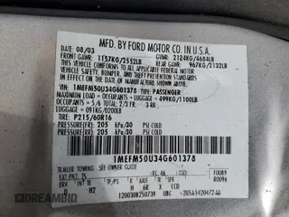 2004 Mercury Sable GS z VIN 1MEFM50U34G601378, wystawiony jako Copart lot #56952825 z przebiegiem 63 456 mil mil oraz Tytuł czysty. Historia ofert i sprzedaży dostępna na DreamBid. Obrazek 12.