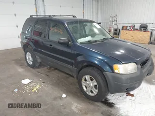 2003 Ford Escape XLT Popular with VIN 1FMYU03103KA06087, listed as a IAAI auction lot 42596326 with 210,441 mi miles and . Bid and sale history available at DreamBid. Image 1.