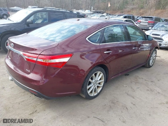 2013 Toyota Avalon XLE with VIN 4T1BK1EBXDU070666, listed as a IAAI auction lot 41766905 with 115,904 mi miles. Bid and sale history available at carsss.com. Image 4.