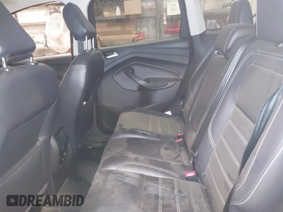 2018 Ford Escape Titanium with VIN 1FMCU9J99JUB94925, listed as a IAAI auction lot 42412800 with 95,880 mi miles and . Bid and sale history available at DreamBid. Image 8.