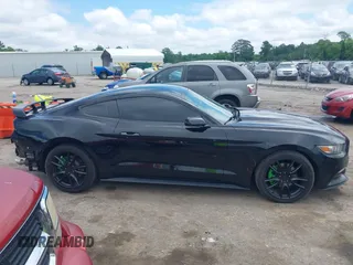 2016 Ford Mustang V6 z VIN 1FA6P8AM8G5251387, wystawiony jako IAAI lot #42231334 z przebiegiem 104 618 mil mil oraz . Historia ofert i sprzedaży dostępna na DreamBid. Obrazek 13.