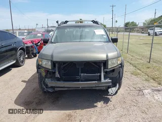 2007 Honda Ridgeline RTL with VIN 2HJYK16577H537990, listed as a IAAI auction lot 42454619 with 182,911 mi miles and . Bid and sale history available at DreamBid. Image 6.