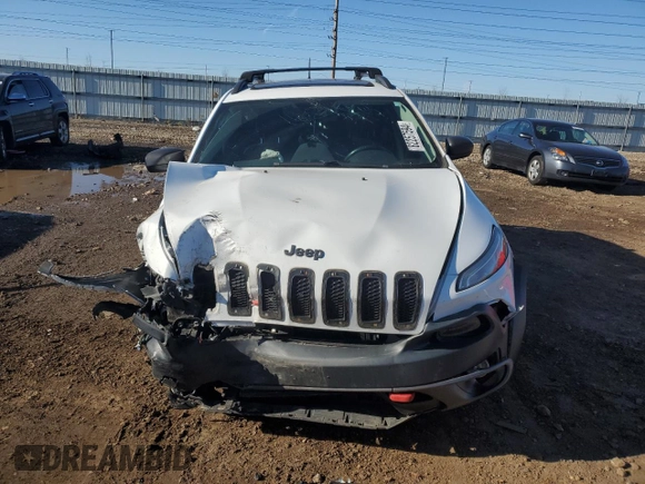 2017 Jeep Cherokee Trailhawk L Plus with VIN 1C4PJMBB3HW506965, listed as a Copart auction lot 82257594 with 106,571 mi miles and Salvage title. Bid and sale history available at DreamBid. Image 5.