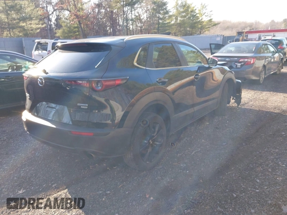 2022 Mazda CX-30 2.5 Turbo with VIN 3MVDMBAY4NM440991, listed as a IAAI auction lot 41072268 with 29,850 mi miles and . Bid and sale history available at DreamBid. Image 4.