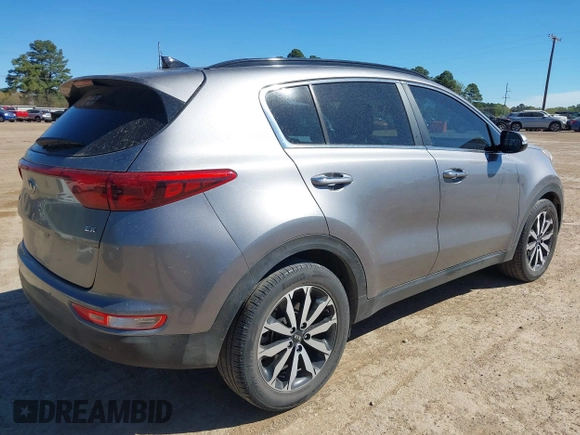 2018 Kia Sportage EX with VIN KNDPN3ACXJ7353395, listed as a IAAI auction lot 41868475 with 86,831 mi miles and . Bid and sale history available at DreamBid. Image 4.