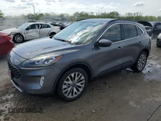2021 Ford Escape Titanium Hybrid with VIN 1FMCU9DZ4MUA56645, listed as a Copart auction lot 54059515 with 31,432 mi miles and Salvage title. Bid and sale history available at DreamBid. Image 1.