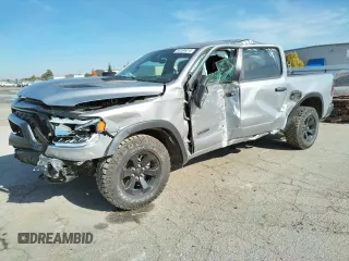 2023 Ram 1500 Rebel with VIN 1C6SRFLT4PN605490, listed as a Copart auction lot 80594614 with 18,959 mi miles and Salvage title. Bid and sale history available at DreamBid. Image 1.