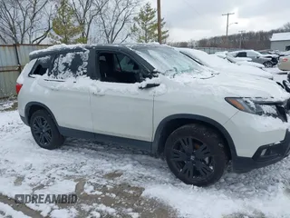 2021 Honda Passport Sport with VIN 5FNYF8H29MB009406, listed as a IAAI auction lot 41246817 with 71,997 mi miles and . Bid and sale history available at DreamBid. Image 13.