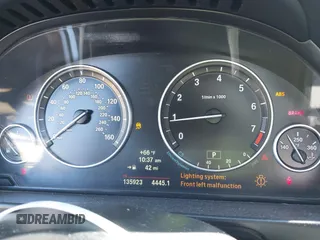 2014 BMW 5 Series 528i with VIN WBA5A5C50ED503130, listed as a IAAI auction lot 41819922 with 135,923 mi miles. Bid and sale history available at carsss.com. Image 7.