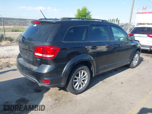 2013 Dodge Journey SXT with VIN 3C4PDDBG1DT606887, listed as a IAAI auction lot 42440507 with 250,836 mi miles and . Bid and sale history available at DreamBid. Image 4.