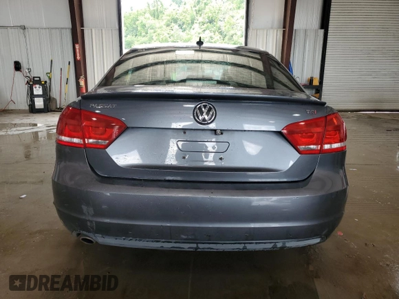 2012 Volkswagen Passat SE with VIN 1VWBH7A39CC102416, listed as a Copart auction lot 61557405 with 170,034 mi miles and Salvage title. Bid and sale history available at DreamBid. Image 6.