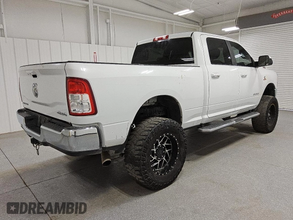 2021 Ram 2500 Big Horn z VIN 3C6UR5DL7MG542214, wystawiony jako Copart lot #52359235 z przebiegiem 119 483 mil mil oraz Tytuł czysty. Historia ofert i sprzedaży dostępna na DreamBid. Obrazek 3.