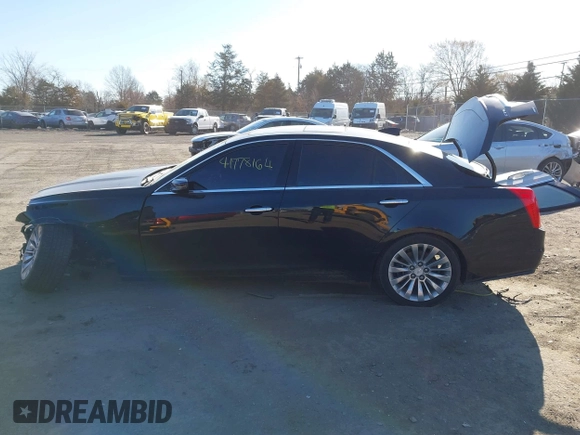 2019 Cadillac CTS Luxury AWD z VIN 1G6AX5SX8K0129858, wystawiony jako IAAI lot #41778164 z przebiegiem 89 695 mil mil oraz . Historia ofert i sprzedaży dostępna na DreamBid. Obrazek 14.