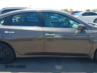 2015 Nissan Altima SL z VIN 1N4AL3AP1FC222925, wystawiony jako IAAI lot #42504682 z przebiegiem 104 012 mil mil oraz . Historia ofert i sprzedaży dostępna na DreamBid. Obrazek 13.