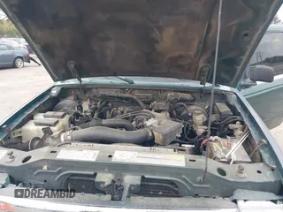 2000 Ford Ranger XL with VIN 1FTYR14VXYTA57062, listed as a IAAI auction lot 42019991 with 191,664 mi miles. Bid and sale history available at carsss.com. Image 10.
