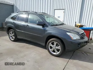 2007 Lexus RX 400h z VIN JTJGW31U972002681, wystawiony jako Copart lot #78883974 z przebiegiem 288 019 mil mil oraz Szkody całkowita. Historia ofert i sprzedaży dostępna na DreamBid. Obrazek 4.