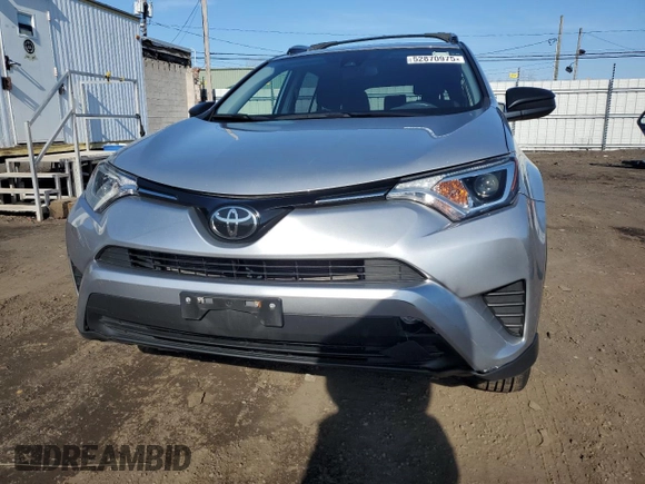 2018 Toyota RAV4 LE with VIN JTMBFREVXJJ220838, listed as a Copart auction lot 52870975 with 125,456 mi miles and Salvage Title. Bid and sale history available at carsss.com. Image 5.