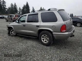 2000 Dodge Durango with VIN 1B4HS28Z6YF121861, listed as a Copart auction lot 87669175 with 115,990 mi miles and Salvage Title. Bid and sale history available at DreamBid. Image 2.
