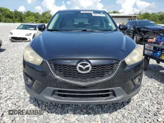 2014 Mazda CX-5 Touring z VIN JM3KE2CY8E0326988, wystawiony jako Copart lot #60473715 z przebiegiem 231 055 mil mil oraz Czysty tytuł • Clean title. Historia ofert i sprzedaży dostępna na DreamBid. Obrazek 5.
