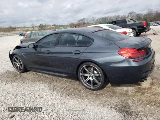 2016 BMW M6 z VIN WBS6E9C59GG437111, wystawiony jako Copart lot #44711734 z przebiegiem 79 471 mil mil oraz . Historia ofert i sprzedaży dostępna na DreamBid. Obrazek 2.