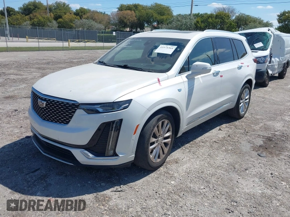 2020 Cadillac XT6 FWD Premium Luxury z VIN 1GYKPCRS1LZ228982, wystawiony jako IAAI lot #41975364 z przebiegiem 84 803 mil mil oraz . Historia ofert i sprzedaży dostępna na DreamBid. Obrazek 16.