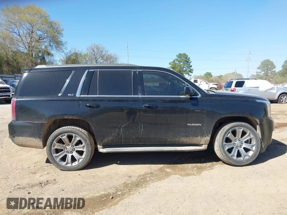 2015 GMC Yukon SLT z VIN 1GKS1BKC8FR112952, wystawiony jako IAAI lot #41836398 z przebiegiem 155 329 mil mil oraz . Historia ofert i sprzedaży dostępna na DreamBid. Obrazek 13.