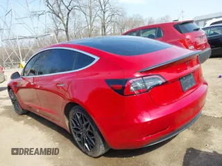 2020 Tesla Model 3 Long Range with VIN 5YJ3E1EB9LF666066, listed as a IAAI auction lot 41759976 with 69,323 mi miles. Bid and sale history available at carsss.com. Image 3.