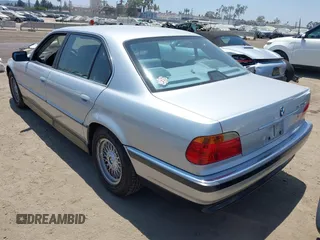 2000 BMW 7 Series 740iL with VIN WBAGH8341YDP14211, listed as a IAAI auction lot 42671152 with 247,472 mi miles and . Bid and sale history available at DreamBid. Image 3.