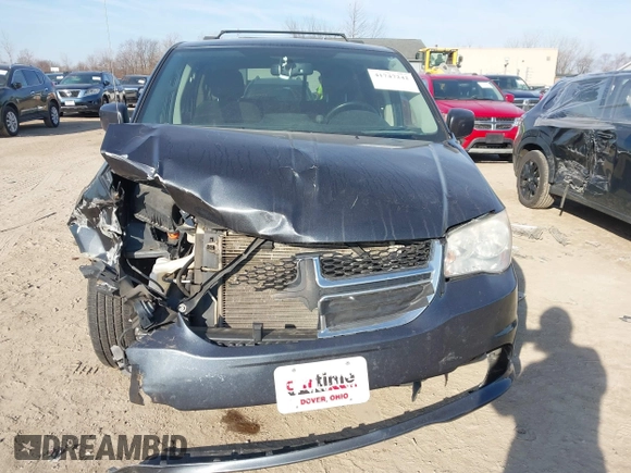 2013 Dodge Grand Caravan SXT with VIN 2C4RDGCG4DR602893, listed as a IAAI auction lot 41747242 with 206,213 mi miles and . Bid and sale history available at DreamBid. Image 12.