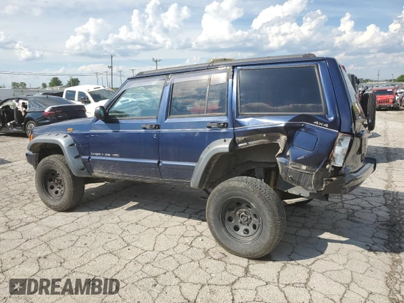 1997 Jeep Cherokee with VIN 1J4FN78S6VL604971, listed as a Copart auction lot 70690304 with 226,913 mi miles and Salvage title. Bid and sale history available at DreamBid. Image 2.