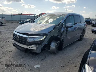 2023 Honda Odyssey Elite with VIN 5FNRL6H9XPB037850, listed as a Copart auction lot 61088635 with 18,312 mi miles and Salvage title. Bid and sale history available at DreamBid. Image 1.