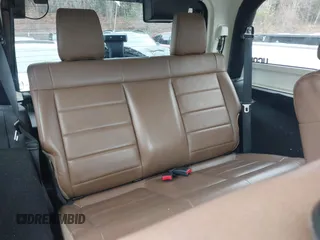 2011 Jeep Wrangler Sahara with VIN 1J4AA5D15BL538240, listed as a IAAI auction lot 41793836 with 172,528 mi miles and . Bid and sale history available at carsss.com. Image 8.