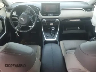 2022 Toyota RAV4 Hybrid XLE Premium with VIN JTMB6RFV4ND535282, listed as a Copart auction lot 61249445 with 82,398 mi miles and Salvage title. Bid and sale history available at DreamBid. Image 8.