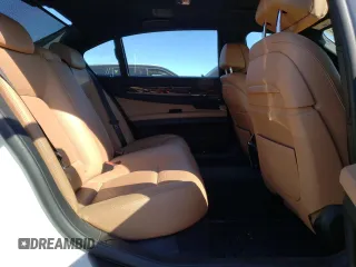 2014 BMW 7 Series 740Li xDrive with VIN WBAYF4C50ED281830, listed as a Copart auction lot 48557035 with 129,497 mi miles and Salvage Title. Bid and sale history available at carsss.com. Image 10.