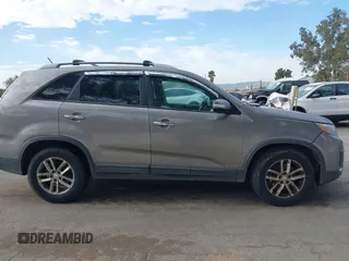 2015 Kia Sorento LX with VIN 5XYKTDA79FG584016, listed as a IAAI auction lot 41703361 with 123,265 mi miles. Bid and sale history available at carsss.com. Image 13.