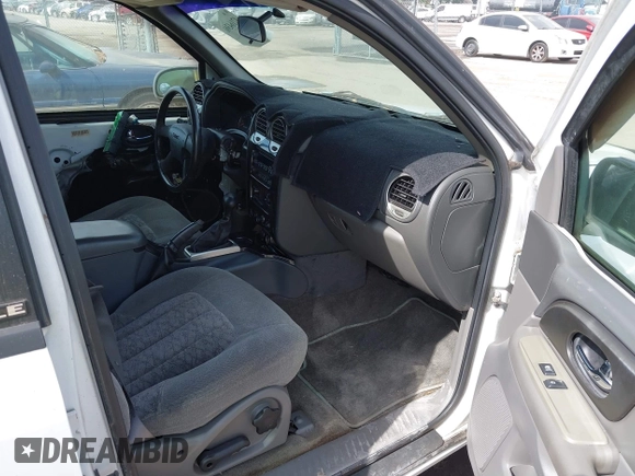 2003 GMC Envoy SLT with VIN 1GKDS13S732379218, listed as a IAAI auction lot 42164368 with Not Provided miles. Bid and sale history available at carsss.com. Image 5.