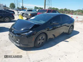 2023 Toyota Prius LE with VIN JTDACAAU9P3007704, listed as a IAAI auction lot 42037372 with 36,276 mi miles. Bid and sale history available at carsss.com. Image 2.