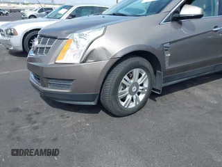 2012 Cadillac SRX Luxury Collection with VIN 3GYFNAE30CS612453, listed as a IAAI auction lot 42048235 with 173,982 mi miles and . Bid and sale history available at carsss.com. Image 6.