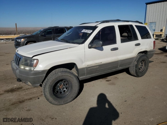 2002 Jeep Grand Cherokee Laredo with VIN 1J4GW48S72C298133, listed as a Copart auction lot 43973315 with 266,437 mi miles and Salvage Title. Bid and sale history available at carsss.com. Image 1.