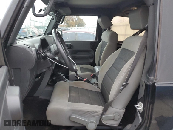 2010 Jeep Wrangler Sport with VIN 1J4AA2D15AL208420, listed as a Copart auction lot 50907635 with 133,840 mi miles and Salvage Title. Bid and sale history available at carsss.com. Image 7.
