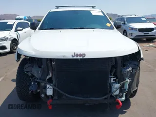 2019 Jeep Grand Cherokee Trailhawk with VIN 1C4RJFLT7KC751143, listed as a IAAI auction lot 42749406 with 54,024 mi miles and . Bid and sale history available at DreamBid. Image 13.