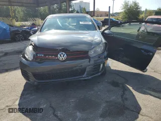 2012 Volkswagen GTI w/Conv & Sunroof с VIN WVWEV7AJ5CW145480, выставлен на аукционе Copart как лот 71466434 с пробегом Не указан миль и Списание • Salvage title. История ставок и продаж доступна на DreamBid. Изображение 5.