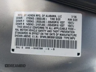 2006 Honda Odyssey EX-L with VIN 5FNRL38656B120539, listed as a IAAI auction lot 42190857 with 242,152 mi miles. Bid and sale history available at carsss.com. Image 9.