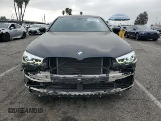 2017 BMW 5 Series 540i with VIN WBAJE5C33HG915675, listed as a Copart auction lot 55857135 with 57,330 mi miles and Salvage title. Bid and sale history available at DreamBid. Image 5.